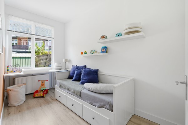 bedroom with shelves.jpeg